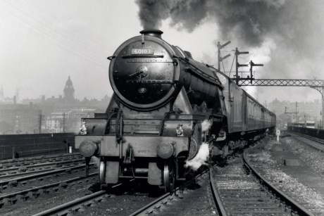 Flying Scotsman A3 class steam locomotive leaving Leeds station%2C 1956